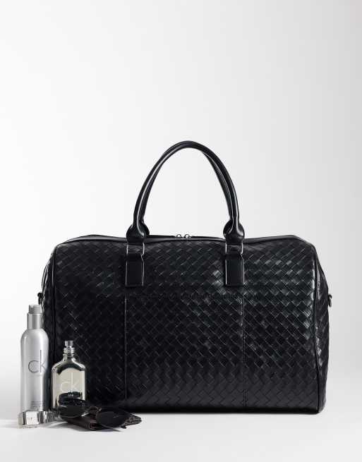 ASOS DESIGN embossed weave holdall bag in black, 2 of 4