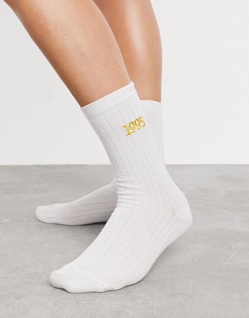 ASOS DESIGN embroidered 1995 calf length sock in white