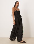 [ASOS DESIGN] ASOS DESIGN embroidered cami ribbon detail in jumpsuit in black 16 BLACK