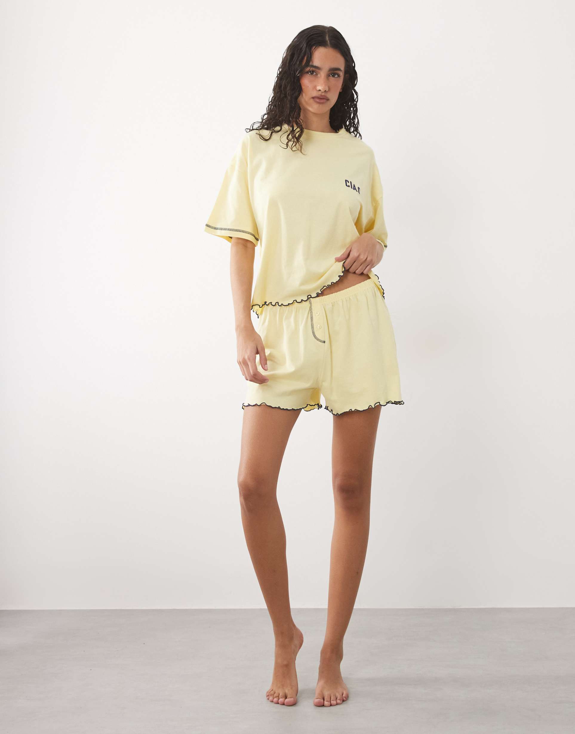 asos design embroidered ciao slogan short sleeve tee and shorts pajama set with lettuce edge in lemon