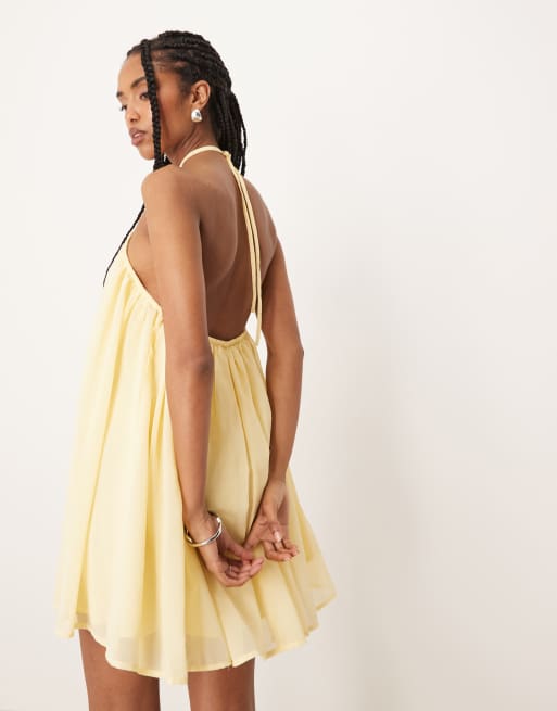 ASOS Design embroidered halter neck mini puff dress in lemon-Orange