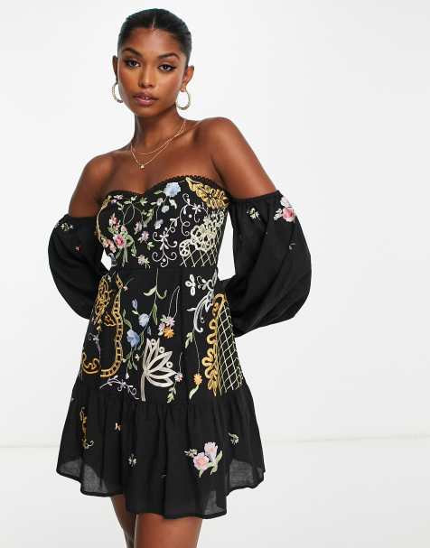 Black off the shoulder dress store with flowers