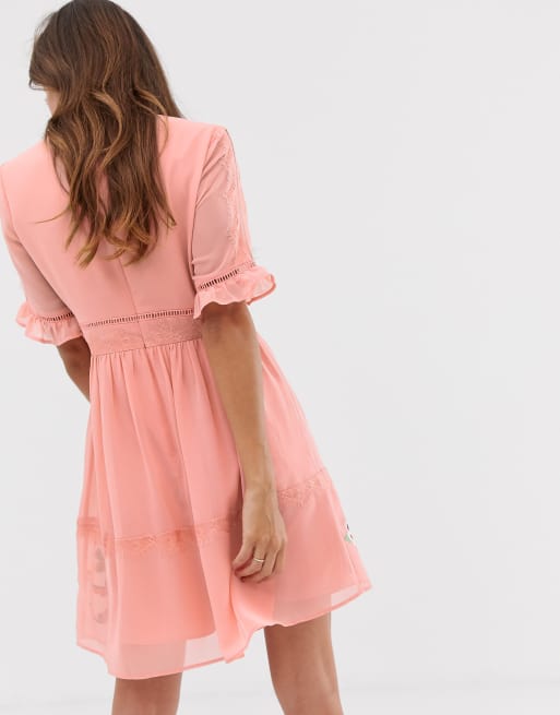 ASOS DESIGN embroidered mini dress with lace trims in Pink