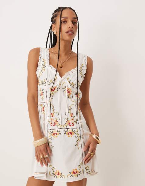 ASOS DESIGN embroidered mini dress with tie bust in white - view 1