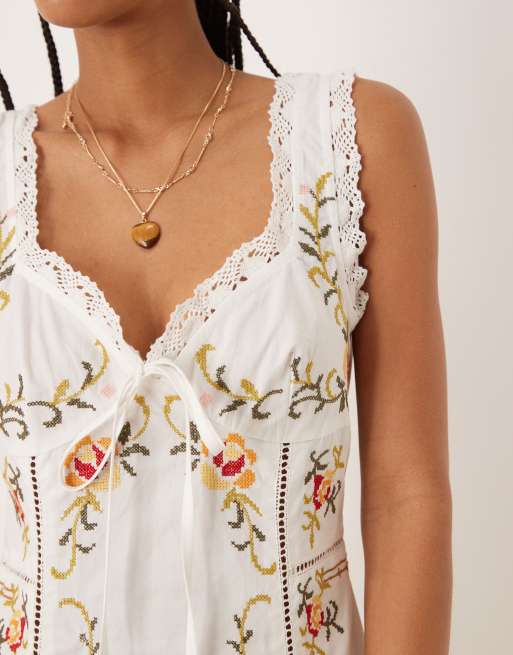 ASOS DESIGN embroidered mini dress with tie bust in white