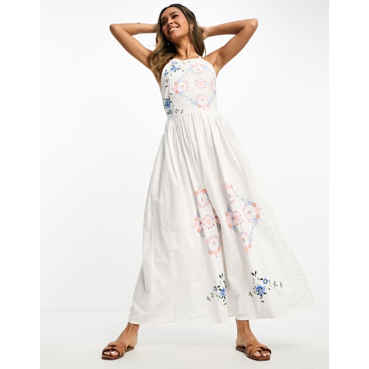 asos design midi dress with pretty floral and bird embroidery ASOS DESIGN embroidered pinny midi dress with open back and cutwork detail  in white