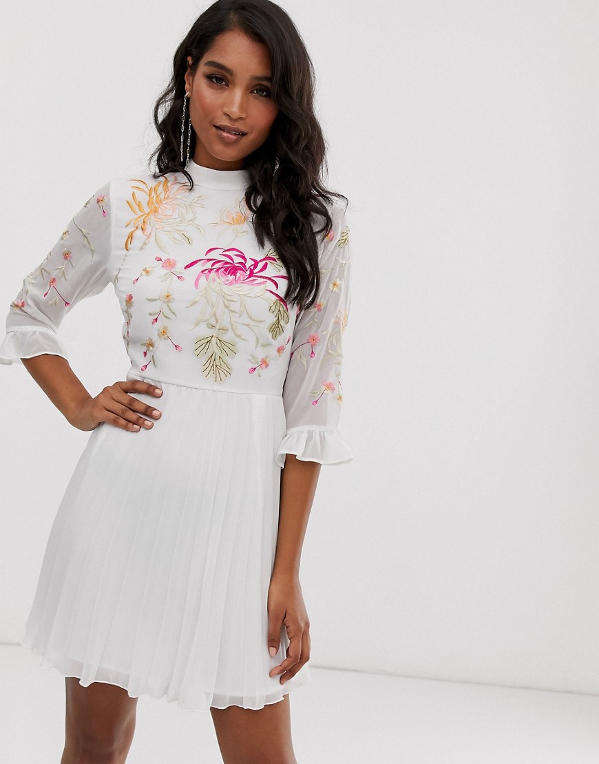 ASOS DESIGN embroidered pleated mini dress with fluted sleeve in white