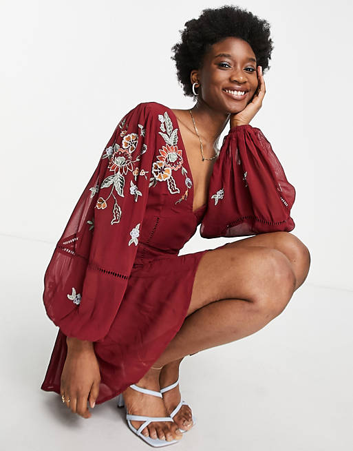 Women embroidered plunge neck smock playsuit in berry 