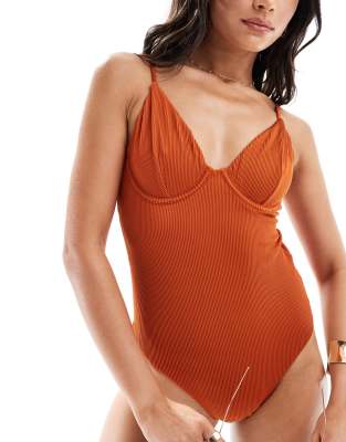 ASOS DESIGN Emily rib underwired swimsuit in rust Sale