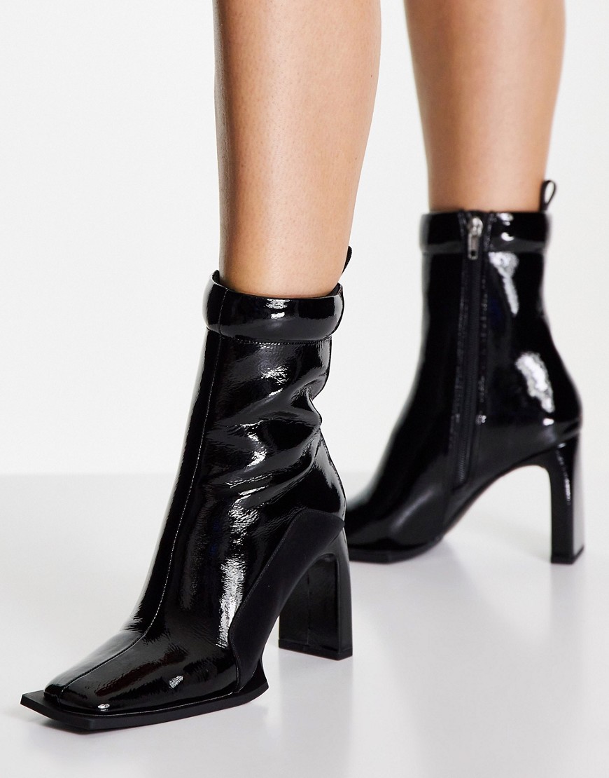 ASOS DESIGN Enchant high-heeled padded boots in black patent
