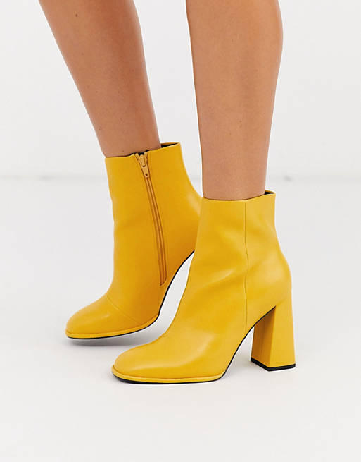DESIGN Ending heeled ankle boots yellow | ASOS