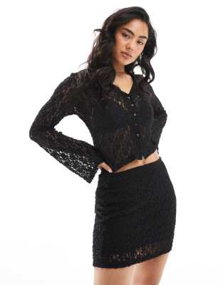 ASOS DESIGN - Eng anliegender Spitzen-Minirock in Schwarz, Kombiteil