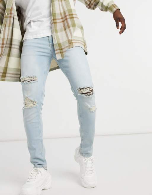 ASOS DESIGN – Eng geschnittene Jeans in heller Vintage-Waschung mit Zierrissen