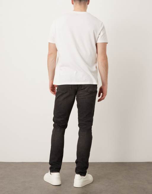 ASOS DESIGN – Eng geschnittene Jeans in verwaschenem Schwarz mit braunem Farbstich, 3 von 5