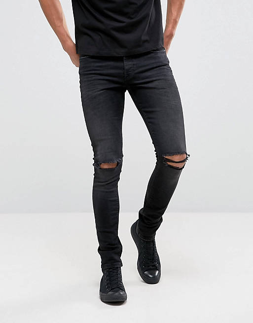 ASOS DESIGN – Enge, 12,5oz schwere Jeans in verwaschenem Schwarz mit zerrissenen Knien