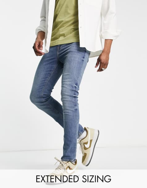ASOS DESIGN – Enge Jeans in verwaschenem Mittelblau - view 1