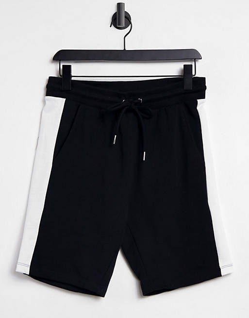ASOS DESIGN – Enge Jersey-Shorts mit seitlichen Streifen in Schwarz