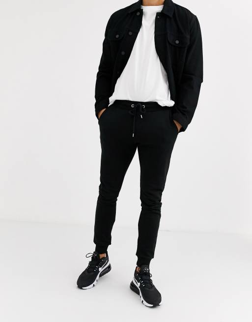 ASOS DESIGN – Enge Jogginghose in Schwarz