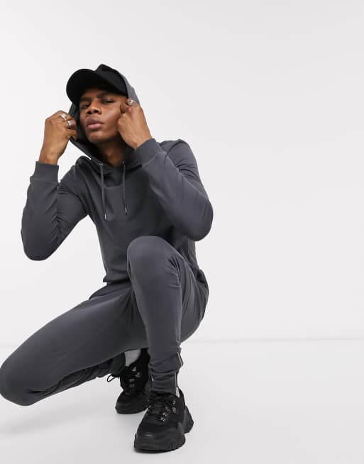 ASOS DESIGN – Enger Trainingsanzug in verwaschenem Schwarz mit Kapuzenpullover und Jogginghose mit silbernen Reißverschlüssen