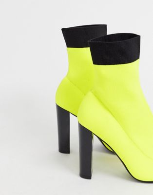 ASOS DESIGN Enhance block heel sock boots in neon yellow knit