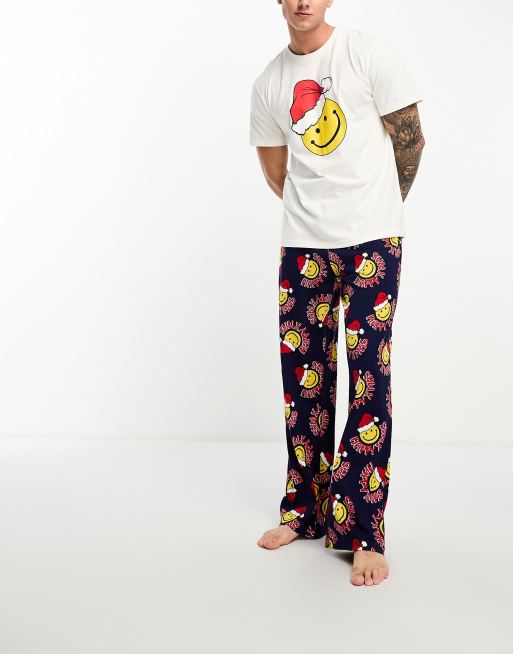 ASOS DESIGN - Ensemble de pyjama avec imprimé smiley Père Noël - Bleu marine