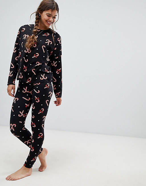 ASOS DESIGN - Ensemble de pyjama de Noël avec leggings et haut à manches longues motif sucre d'orge