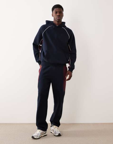 ASOS DESIGN - Ensemble sweat à capuche effet rapiécé et pantalon de jogging - Bleu marine - view 1