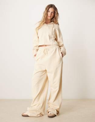 ASOS DESIGN - Ensemble sweat à capuche zippé et pantalon de jogging à surpiqûres - Jaune beurre - view 1