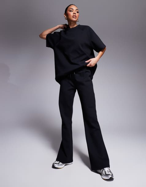 ASOS DESIGN - Ensemble t-shirt à manches raglan et pantalon de jogging évasé en maille interlock - Noir - view 1