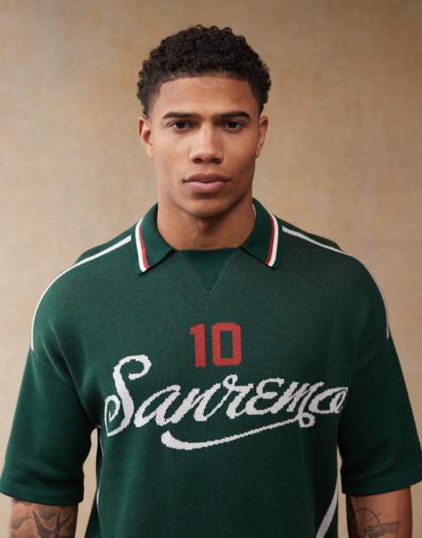 ASOS DESIGN – Entspanntes, kastiges Strick-Poloshirt in Dunkelgrün mit Sportmuster - view 1
