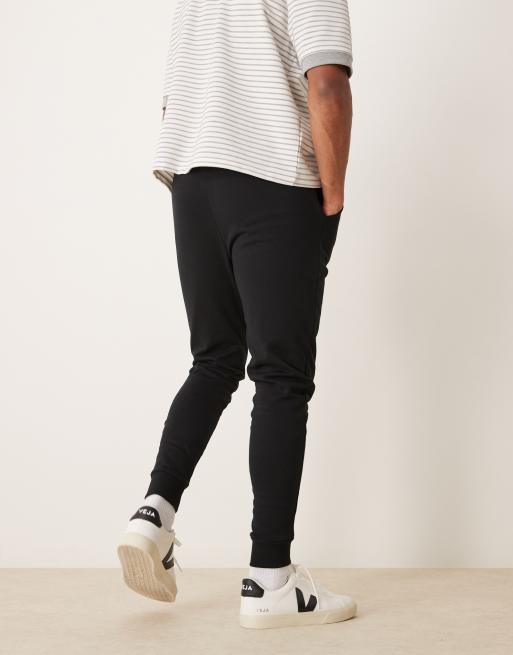 ASOS DESIGN Essential Enge Jogginghose in Schwarz