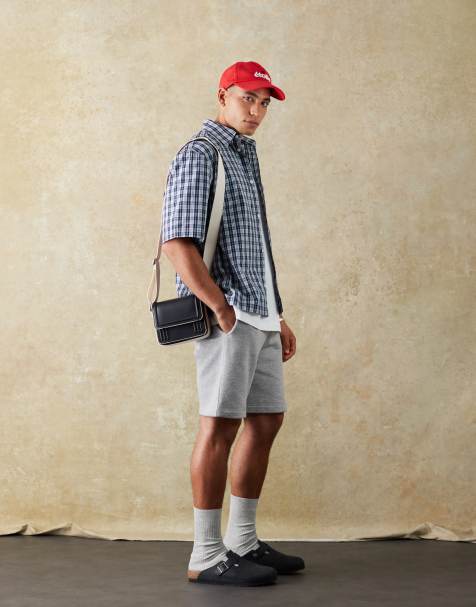 ASOS DESIGN – Essential – Gråmelerade, medellånga shorts med smal passform - view 1