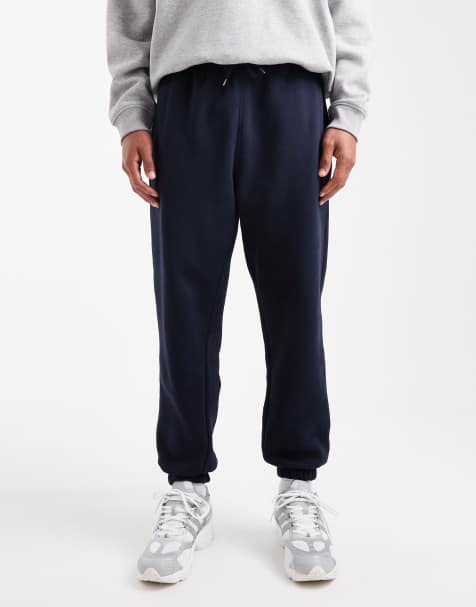 ASOS DESIGN - Essential - Marineblå tapered joggingbukser - view 1