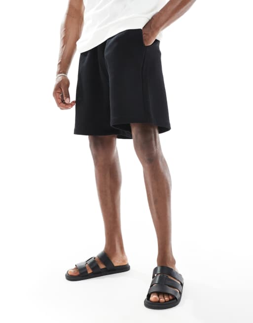 ASOS DESIGN essential mid length oversized shorts in black