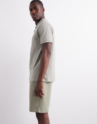 ASOS DESIGN essential mid length slim shorts in light khaki - view 1