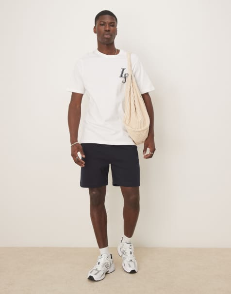ASOS DESIGN essential mid length slim shorts in navy - view 1