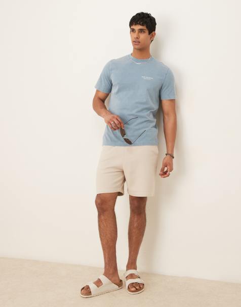 ASOS DESIGN essential mid length slim shorts in stone - view 1