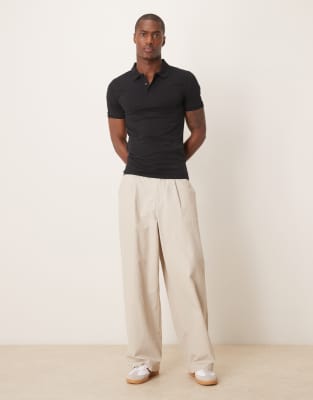 ASOS DESIGN muscle fit polo in black