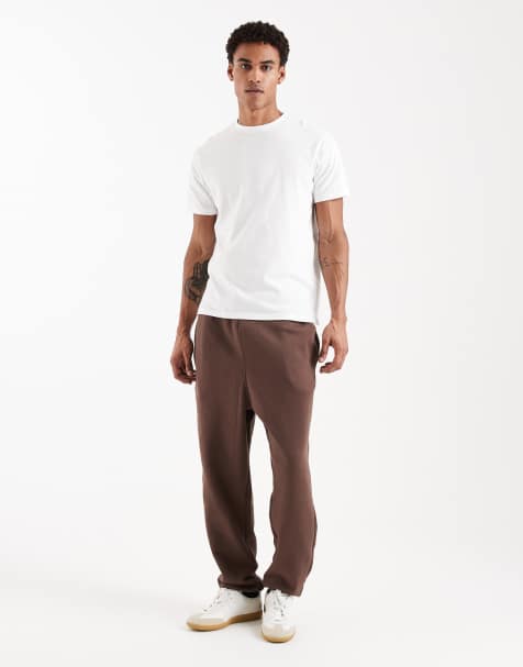 ASOS DESIGN essential oversized sweatpants in brown - view 1