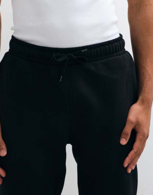 ASOS DESIGN essential slim sweatpants in black , 3 of 5