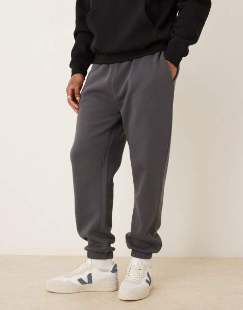ASOS DESIGN essential  tapered jogger in washed black - view 1