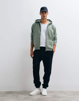 Asos Design Essential Tapered Sweatpants In Black