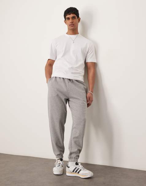 ASOS DESIGN essential tapered trackies in grey marl - view 1