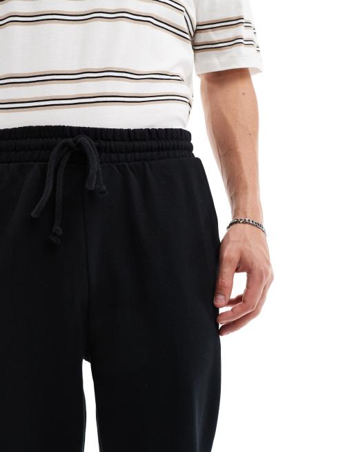 ASOS DESIGN – Essential – Zwężane czarne joggersy, 2 z 5