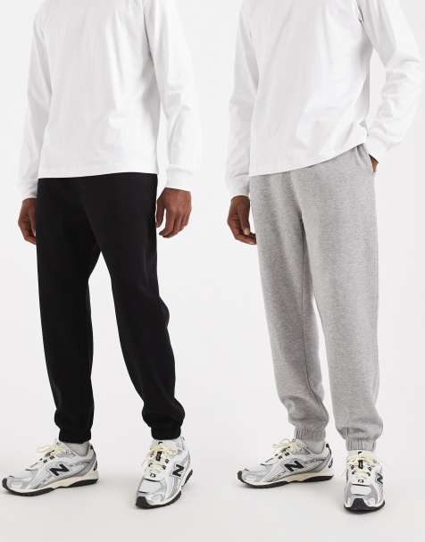 ASOS DESIGN essentials 2 pack tapered sweatpants in black and heather gray - view 1