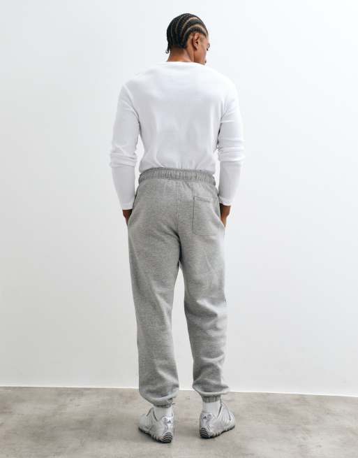 ASOS DESIGN – Essentials – Gråmelerade, avsmalnande mjukisbyxor, 4 av 5