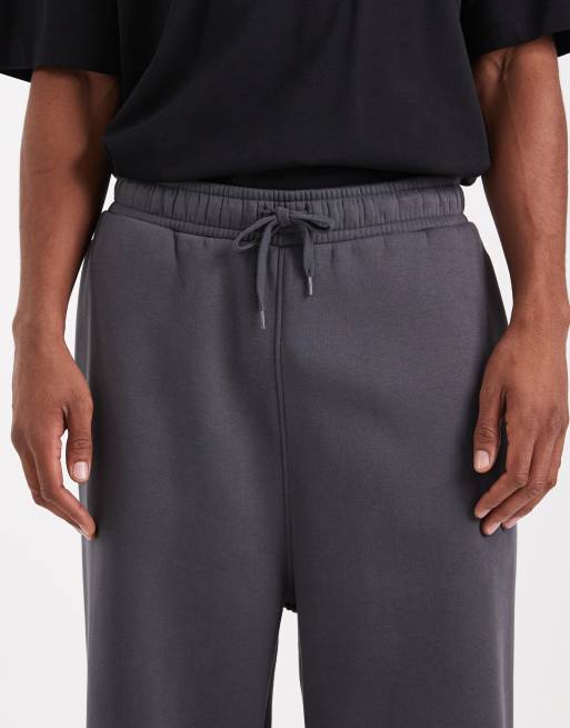 ASOS DESIGN - Essentials - Joggingbroek met wijde pijpen in zwart met wassing , 5 van 5