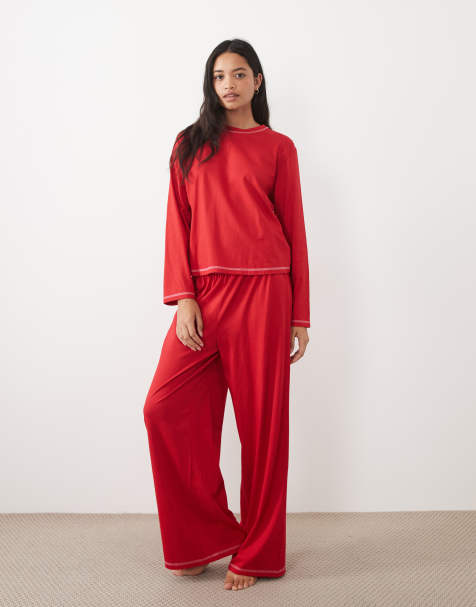 ASOS DESIGN Essentials long sleeve pyjama set in red with contrast overlock stitch - view 1