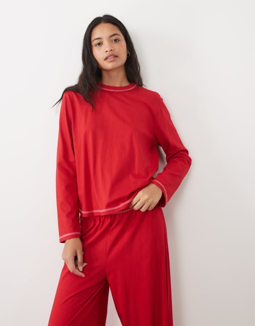 ASOS DESIGN Essentials long sleeve pyjama set in red with contrast overlock stitch, 3 of 4