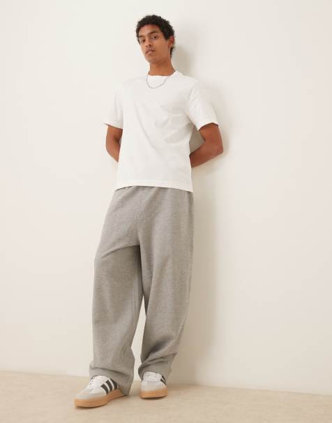 ASOS DESIGN essentials loose fit trackies in grey marl - view 1